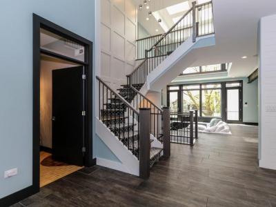 Foyer And Two Story Atrium In DJK Modern Farm House