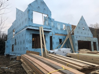 Framing Stage - Wall Installation With DOW 1%22 Foam Board And DOW Sheathing  .