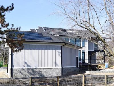 DJK Eco-Smart Home Hardie Siding And Stone Kneewall 