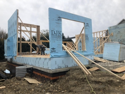 Framing Stage - Wall Installation With DOW 1%22 Foam Board And Sheathing 4.