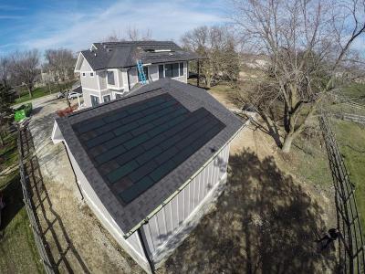 DOW Powerhouse Solar Shingles Installed Above Garage On Modern Farm House Eco-Smart Home  