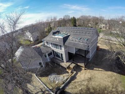 Bracket Installation For Suniva Solar Panels And Dow Powerhouse Solar Shingles On Modern Farm House Eco-Smart Home 