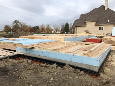 Framing Stage - Wall Installation With DOW 1%22 Foam Board And Sheathing.